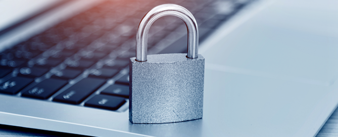 metal lock on laptop for IT security