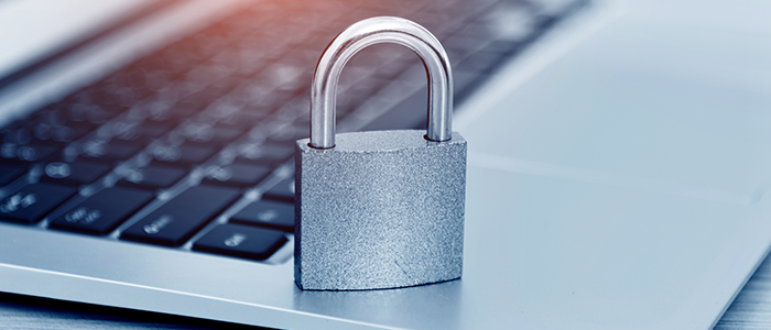 metal lock on laptop for IT security
