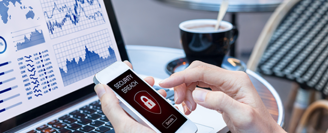 Woman holding phone with cybersecurity breach